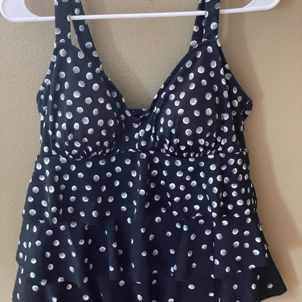 Cute and well fitting swim top with built in bra. Wear as a swim top or ???